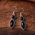 Vintage geometric pendant earrings in black and purple with bohemian retro style