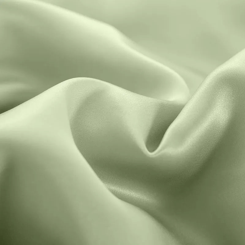 Solid colour silk duvet cover in lotus pink showing double-sided plain weave fabric