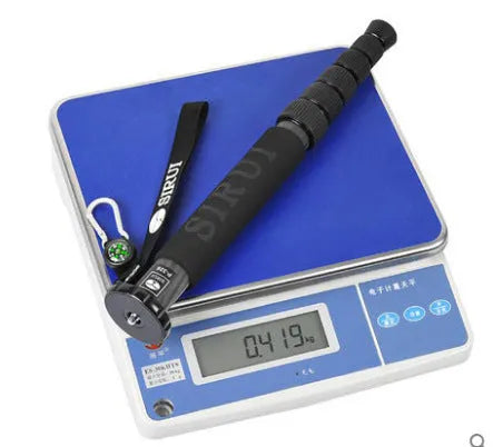 Black carbon fibre monopod for SLR cameras extended to maximum 1540mm height