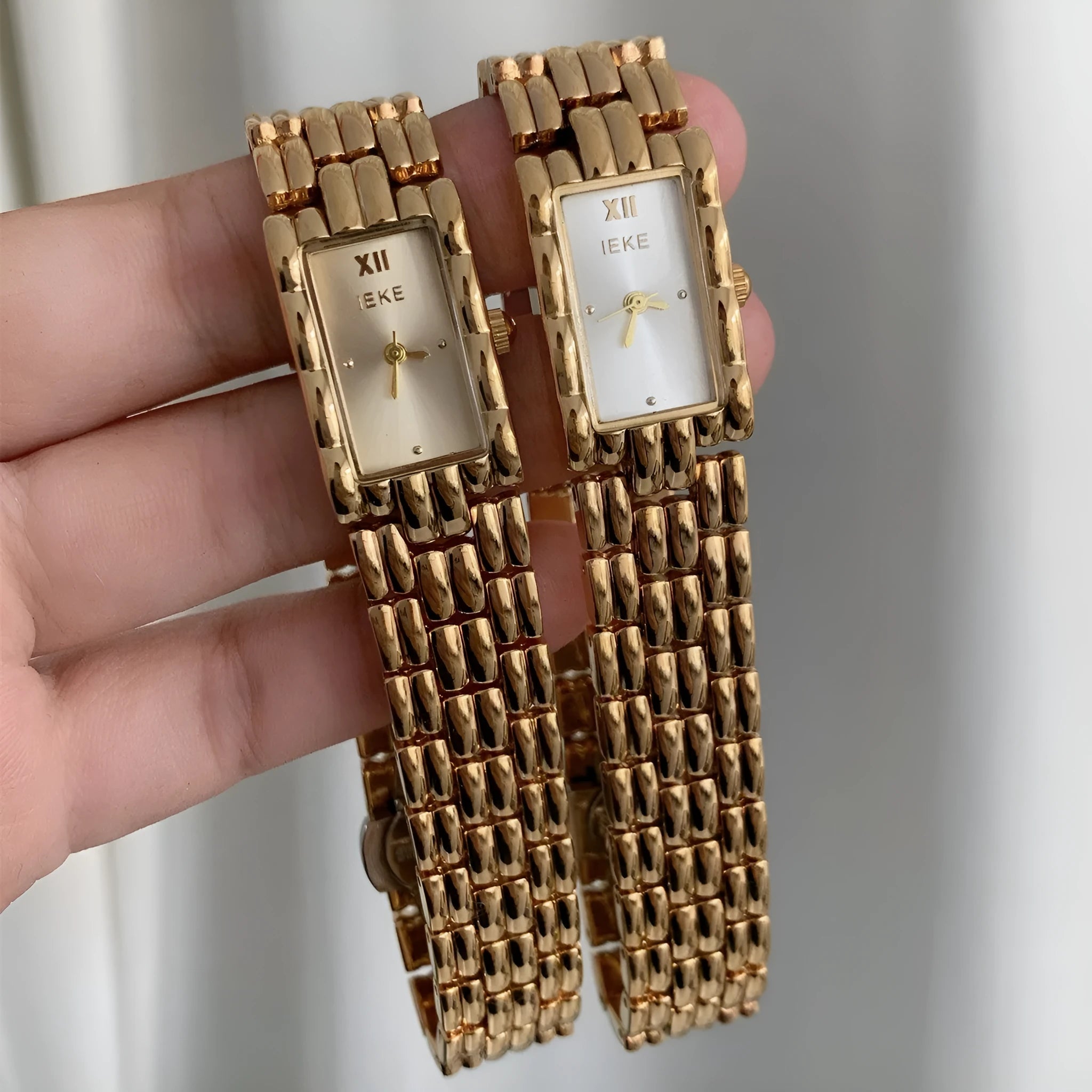 Women's stainless steel bracelet watch with 15mm dial and butterfly clasp in silver and gold colours