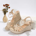 Women's beige wedge sandals with fish mouth open toe design and cloth upper material