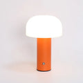 USB-powered plastic table lamp with three-colour LED effects in black, white, orange, or green finishes