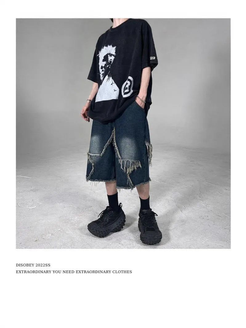 Blue retro denim shorts with frayed edges and five-pointed star decoration, loose fit style