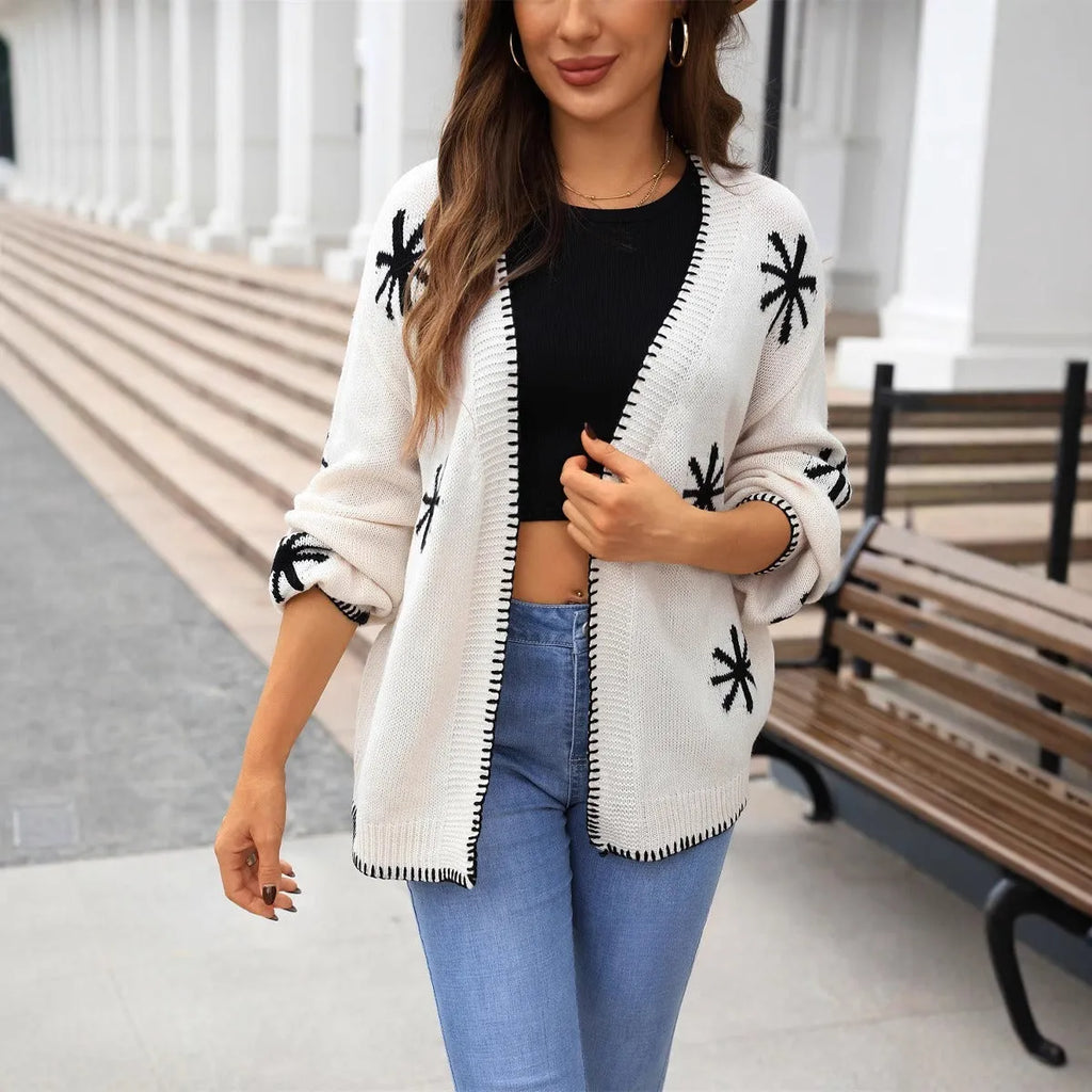Women's beige jacquard knitted coat with floral pattern, loose fit, and off-neck design