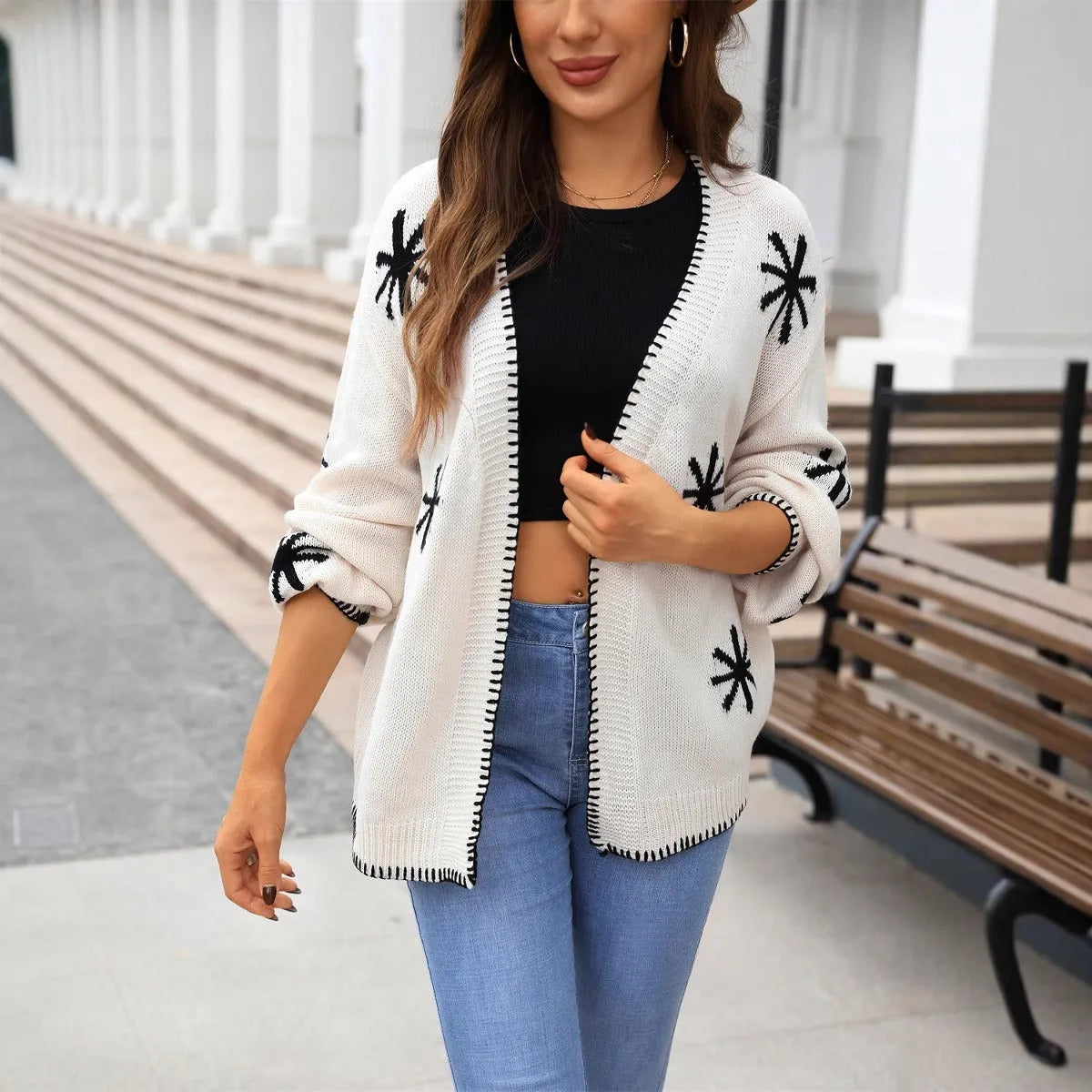 Women's beige jacquard knitted coat with floral pattern, loose fit, and off-neck design