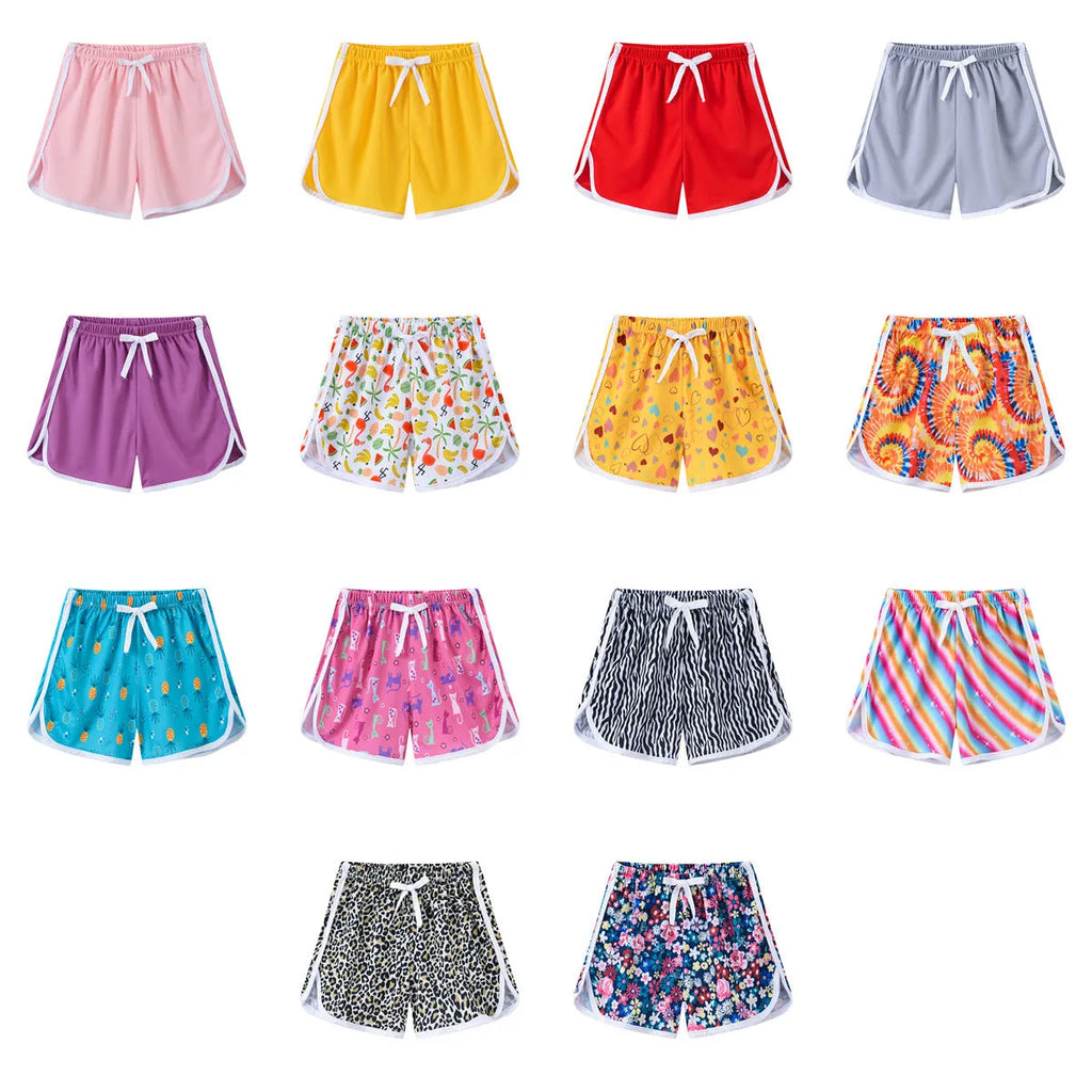 Children's polyester beach shorts in multiple colours and patterns with size options from 100 to 140 yards