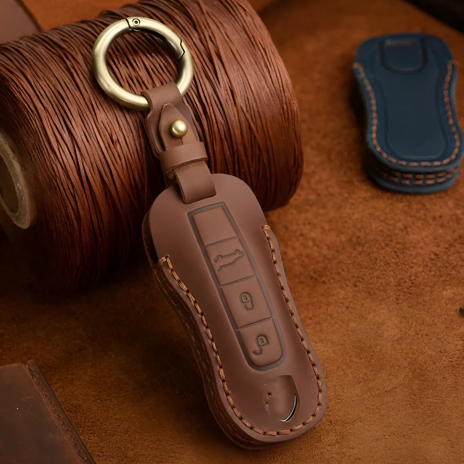 Authentic leather Porsche key cover with retro buckle in blue and brown colour options