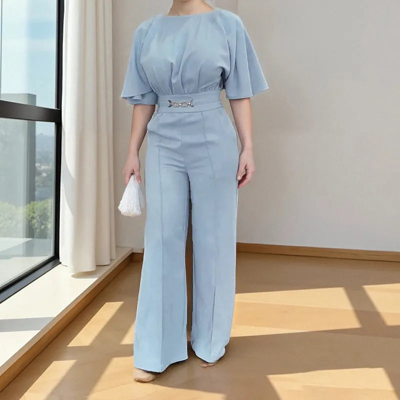 Blue men's polyester suit set with trousers and a long-sleeve top on a mannequin.