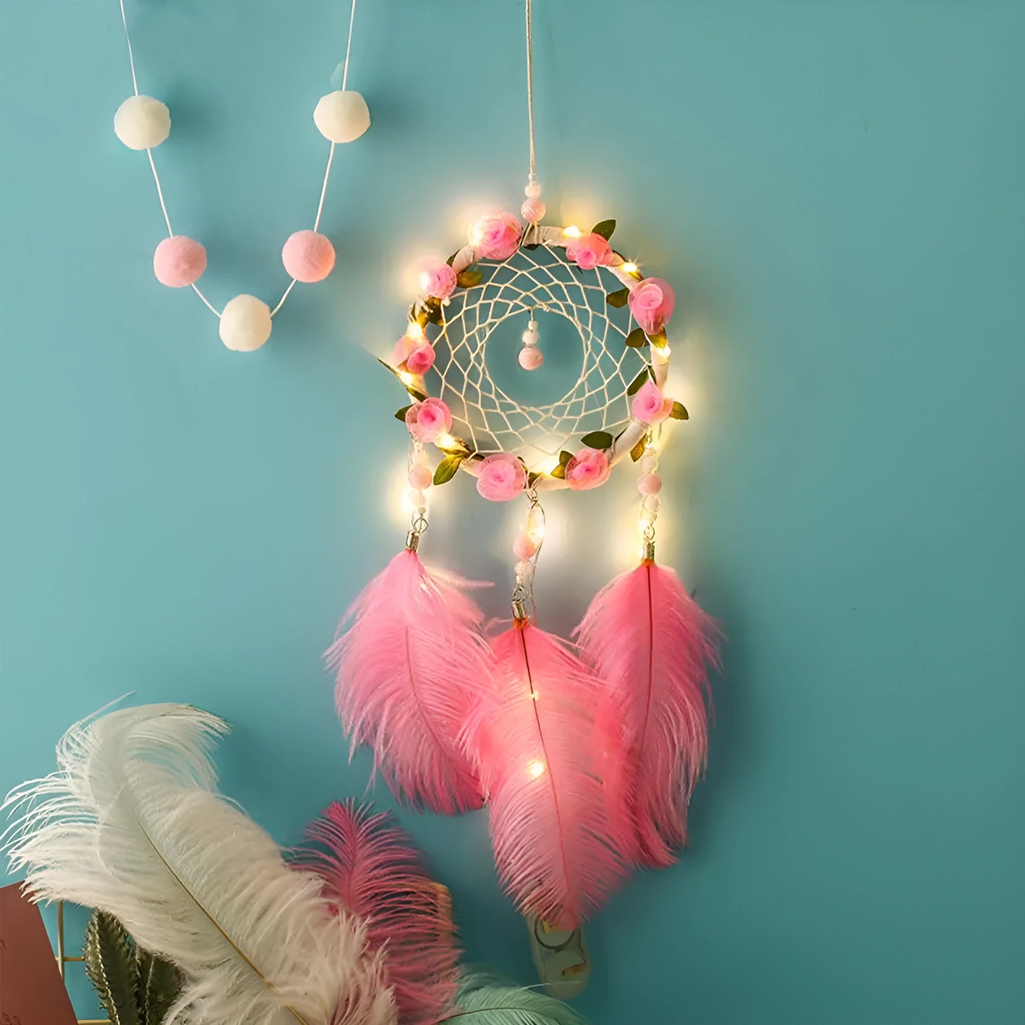 Pink ostrich feather dreamcatcher wind chime wall decoration measuring 10cm