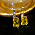 Women's square crystal earrings in red, yellow, and purple colours with copper construction