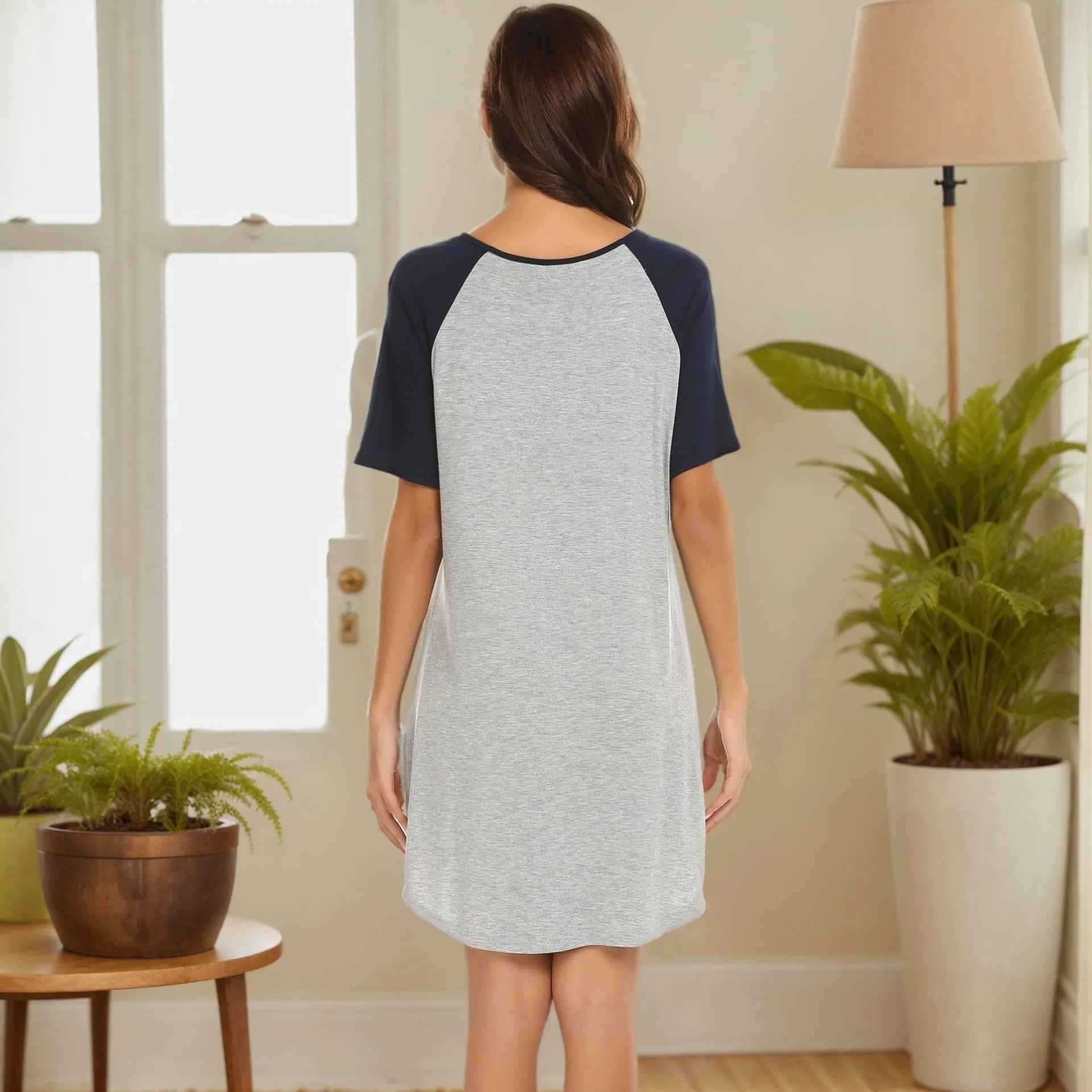 Women's double brushed nightdress with navy contrast patchwork sleeves in Shallow Flower Ash colour.