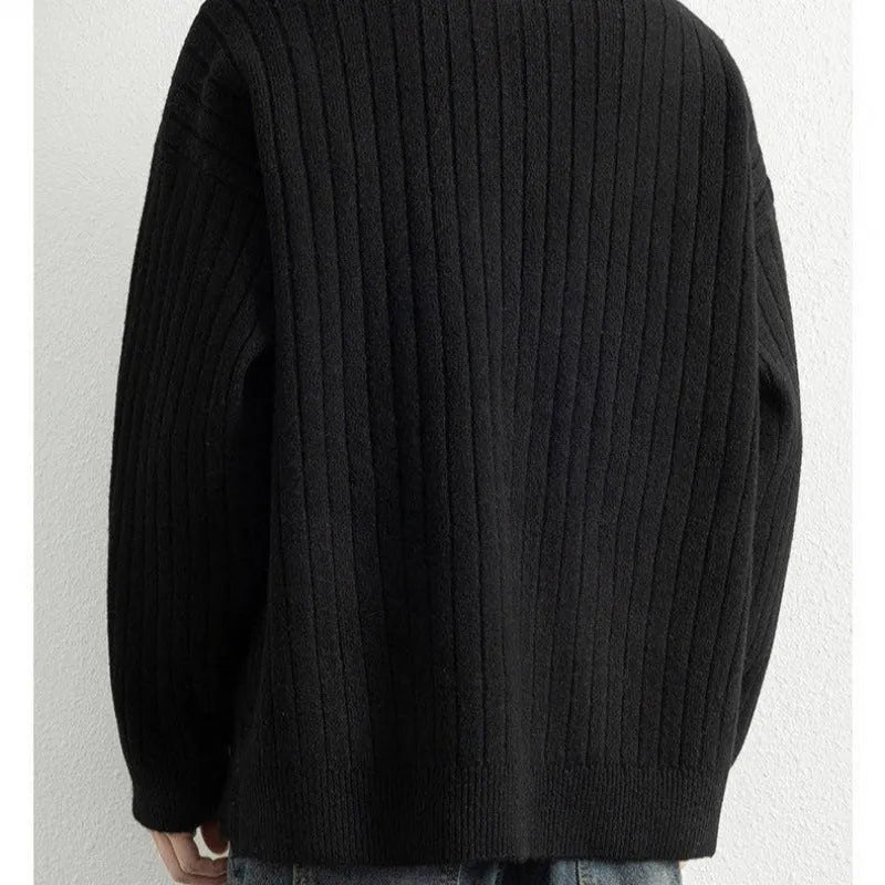 Men's grey half zip sweater with textured knit pattern and loose fit long sleeve design