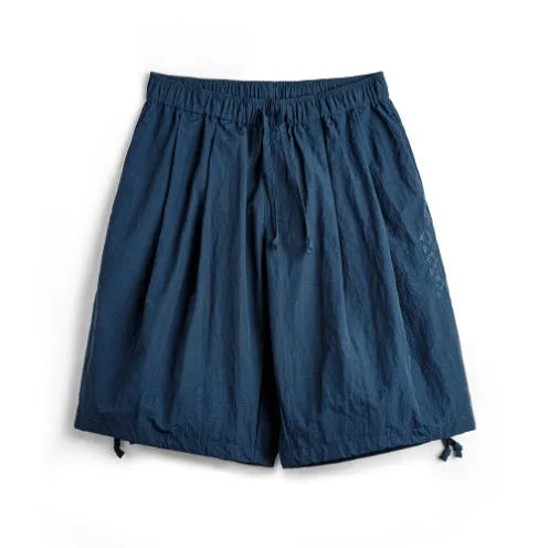 Men's Prussian Blue nylon shorts with embroidered design and elastic waistband