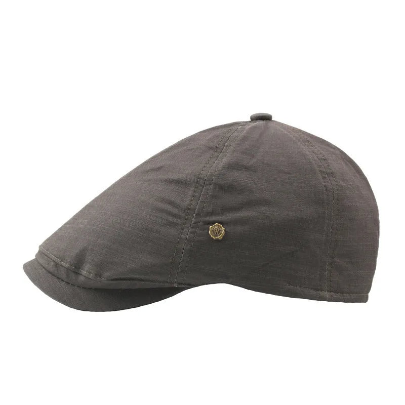 Plaid men's flat cap with copper button in cotton linen, distressed finish, adjustable fit, solid colour collection