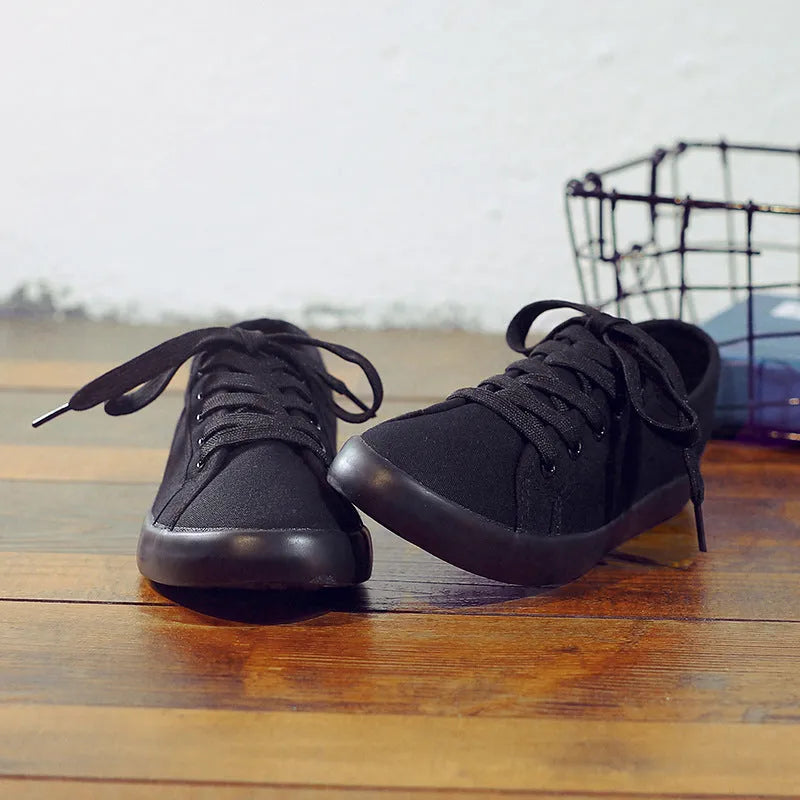 Korean style all black women's flat canvas work shoes with lace-up front