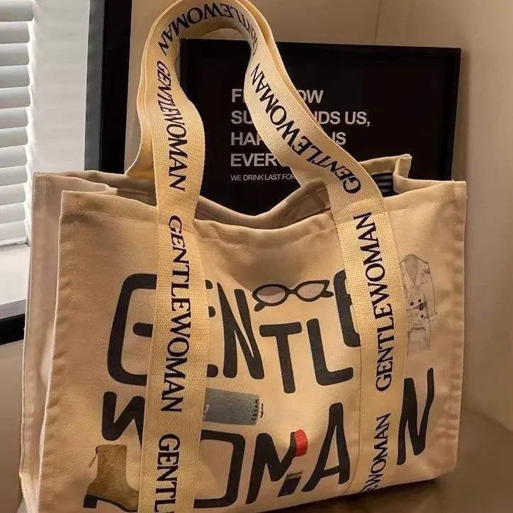 Women's canvas tote shoulder bag with large capacity and printed design options