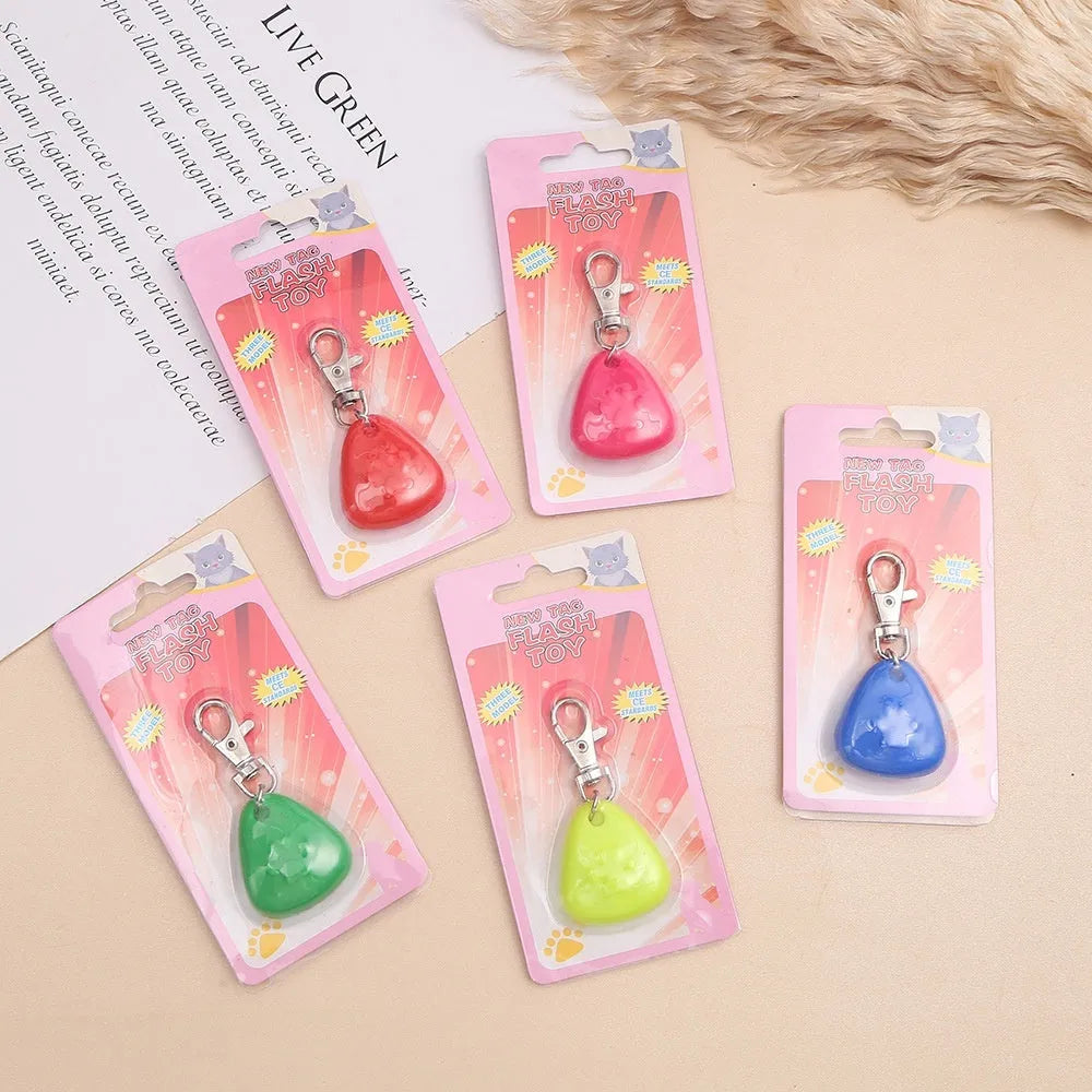 Silicone triangle-shaped light-up pendant for pet costumes in red, pink, blue, green, and yellow colours.