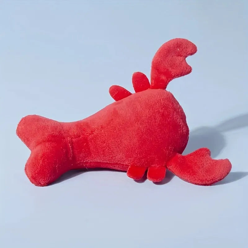 Red lobster-shaped squeaky dog toy for small to medium breeds