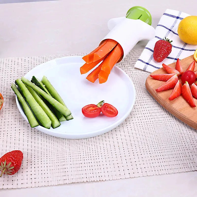 White kitchen vegetable fruit slicer with six stainless steel blades for cutting cucumbers carrots strawberries.