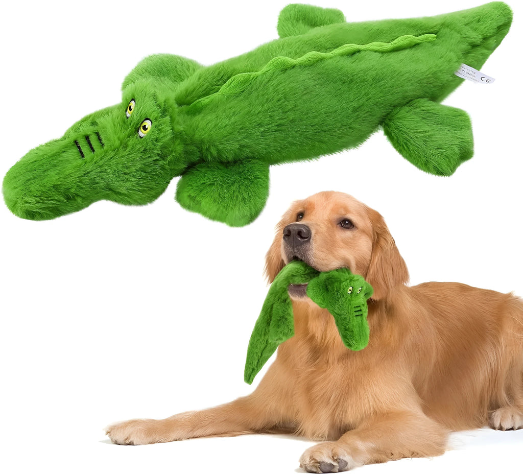 Green crocodile plush dog toy with no stuffing, showing squeaker in head and crinkle paper tail