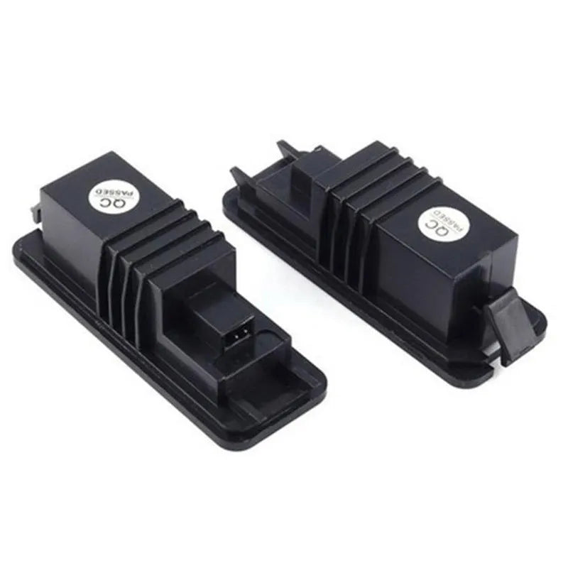 Two white LED licence plate light bulbs for Volkswagen Golf, Polo, and Phaeton models.