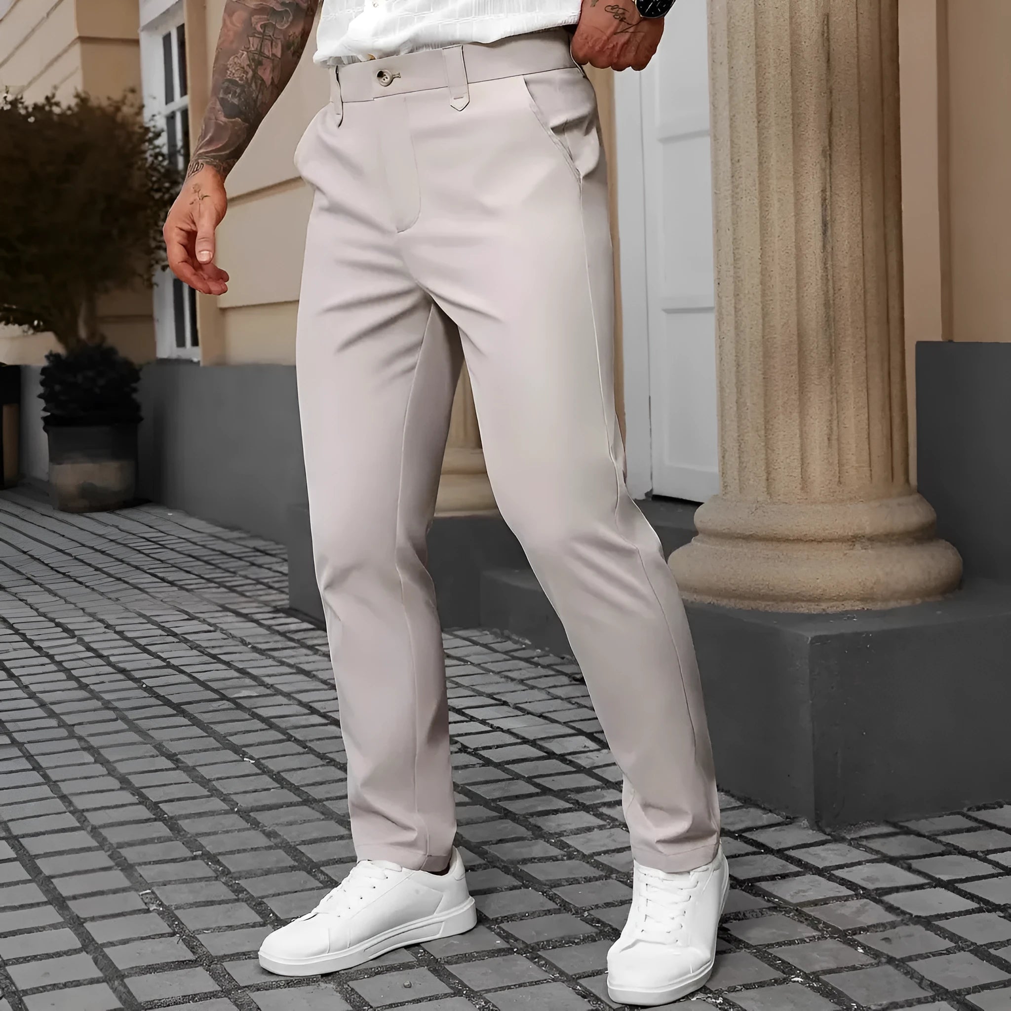 Men's straight leg business casual trousers in solid colours on a hanger.