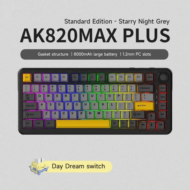 Black, Grey and Yellow three-mode wireless mechanical keyboard with key puller tools on a desk