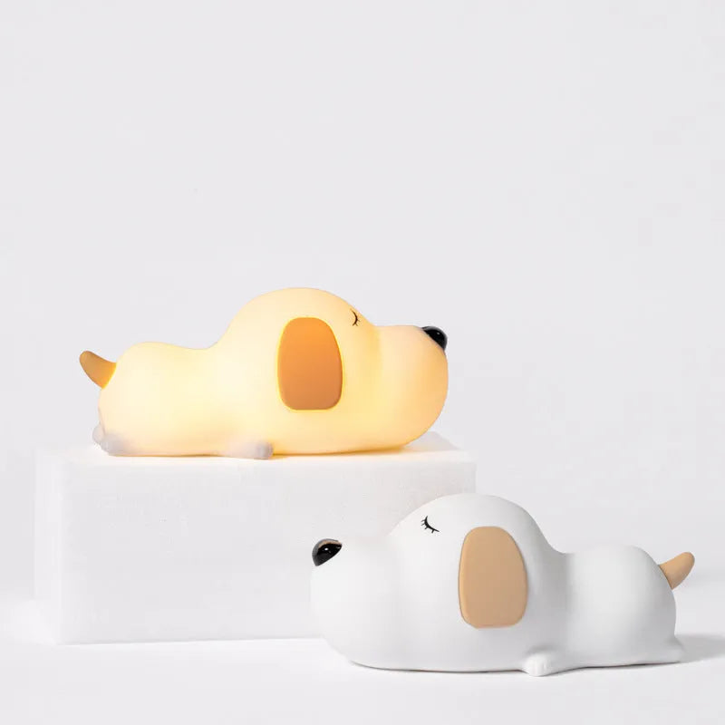 Cute two-colour cartoon dog silicone night lamp with USB cable for power.