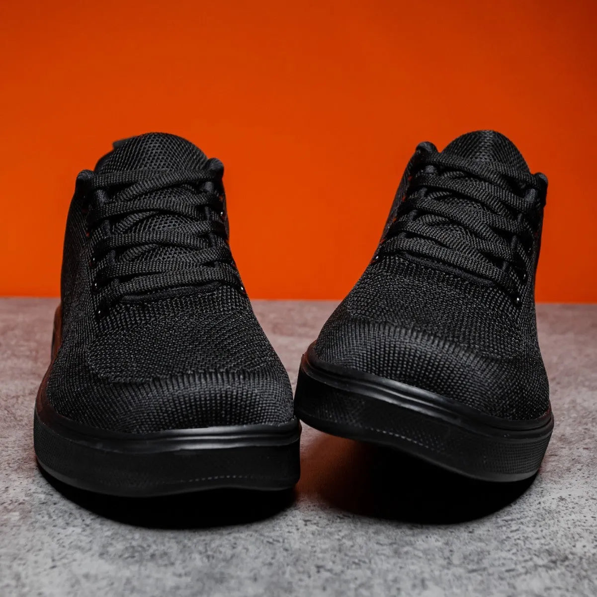 Light white and black mesh casual sneakers with flat EVA soles and round toes on a white background.