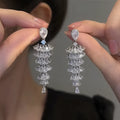Silver pagoda Christmas tree drop earrings with sparkling zircon decoration on copper studs