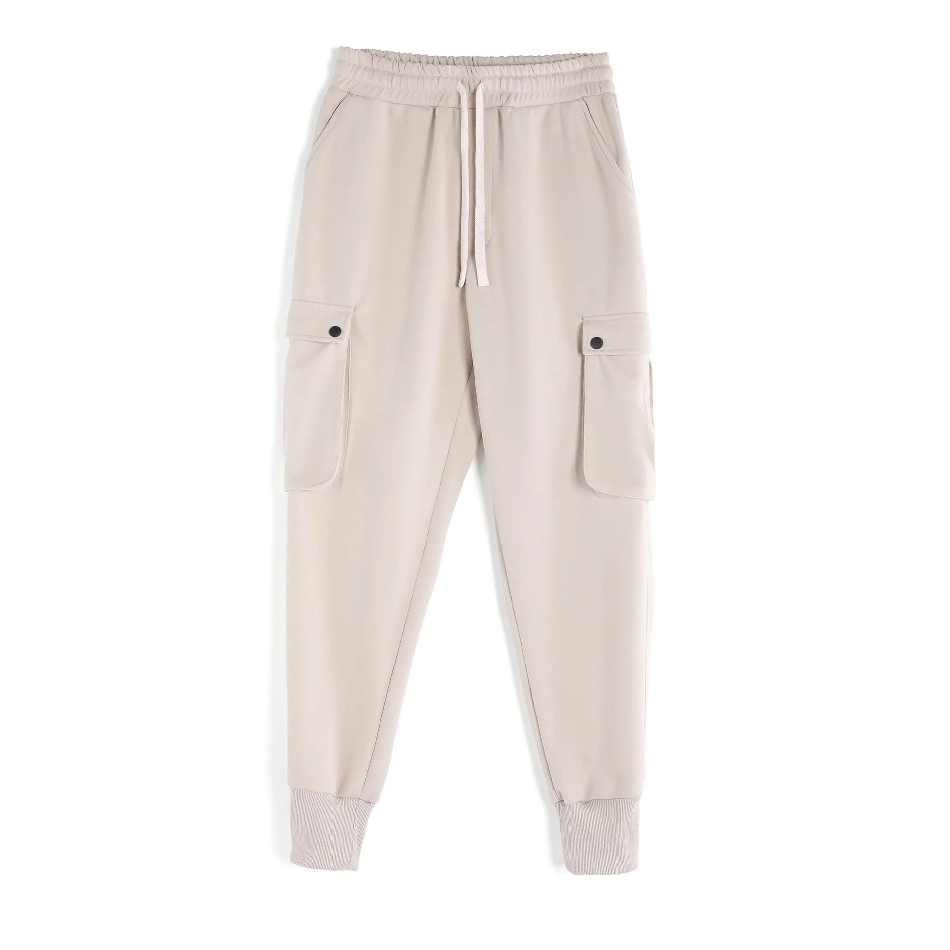 Men's loose grey cotton sports trousers with ankle ties and side pockets laid flat.