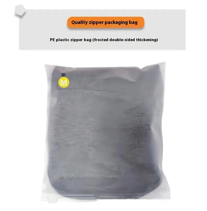 Heather grey dog anxiety vest or calming jacket on a model, showing size range from XXS to XXL.