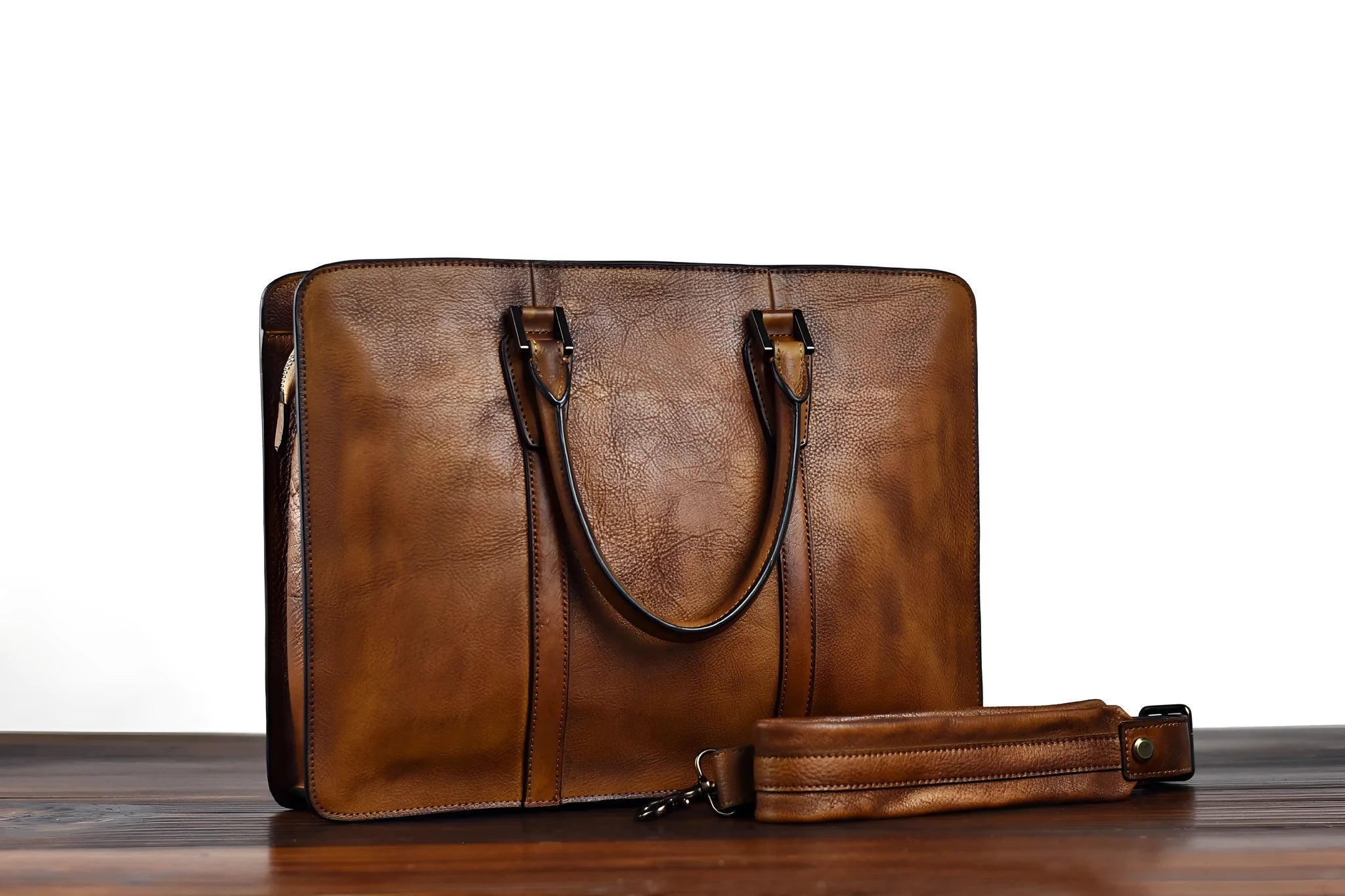 Men's brown leather retro handbag with a horizontal square shape and zipper opening