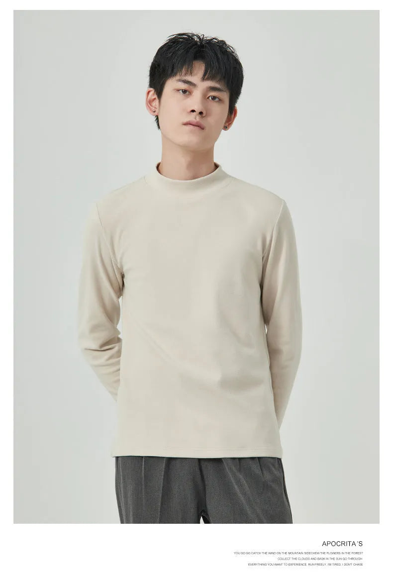 Man wearing a beige half-high collar long-sleeved T-shirt for casual autumn winter wear