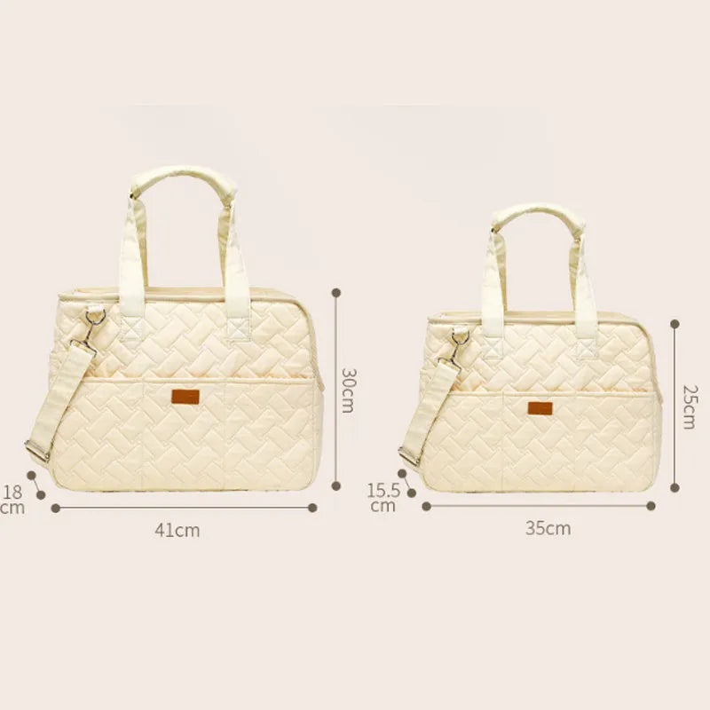 Grey and white pet carrier handbag with mesh panels and multiple pockets for cat or small dog transport