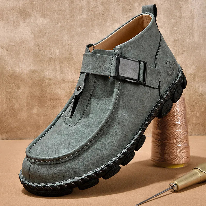 Men's black casual slip on shoes with handmade stitching and flat soles