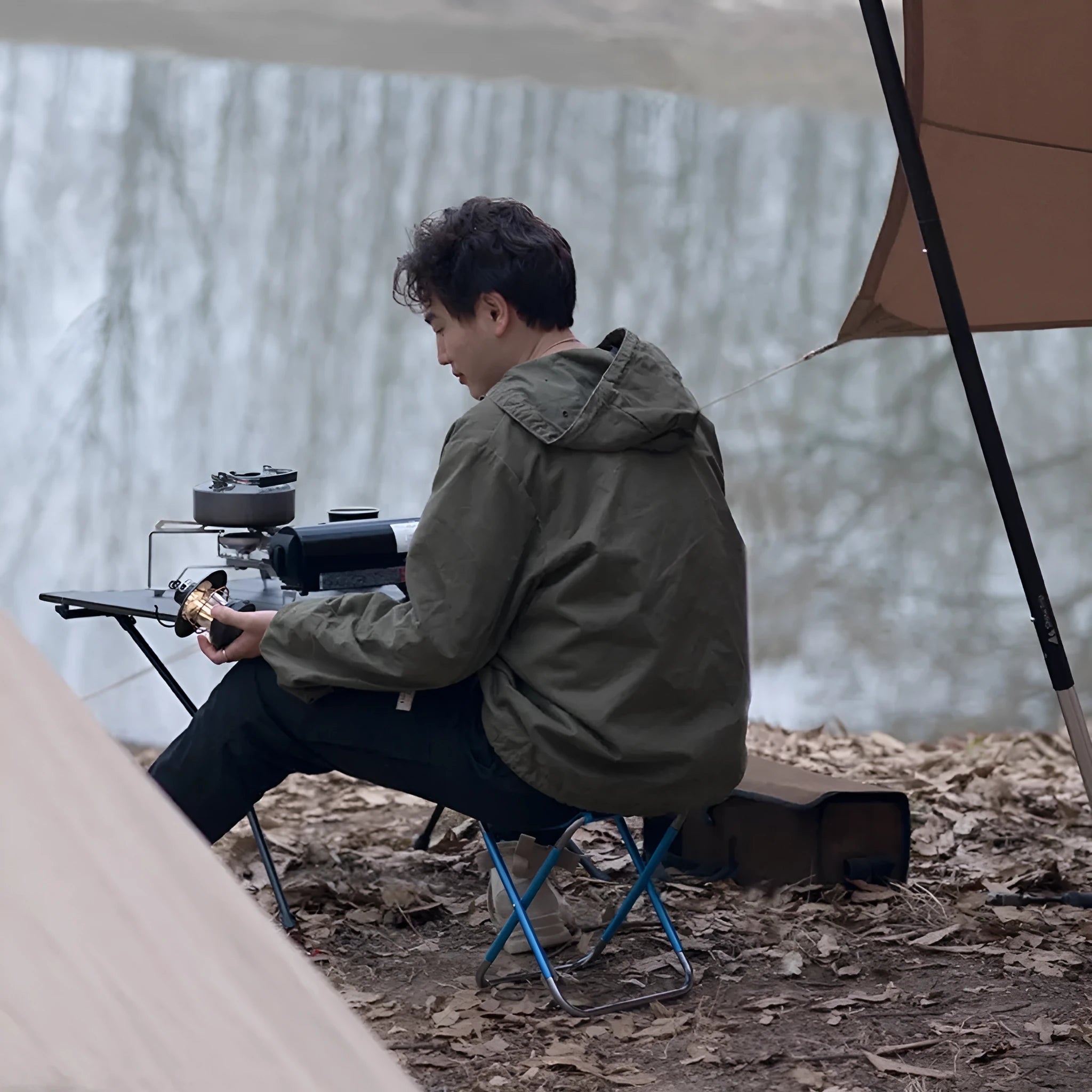 Black ethnic style aluminium alloy folding camping stool in open position