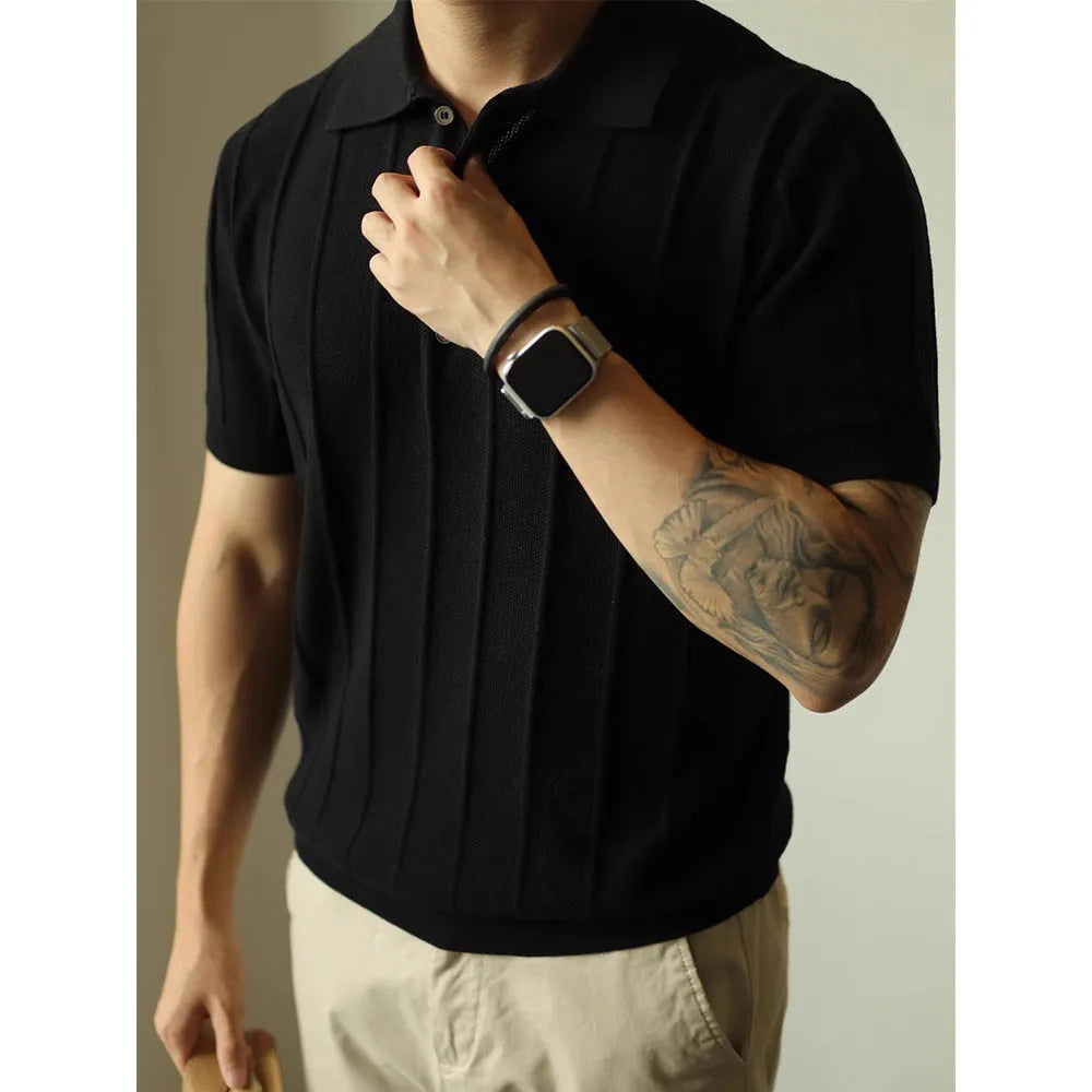 Men's solid black loose fit t-shirt on a hanger