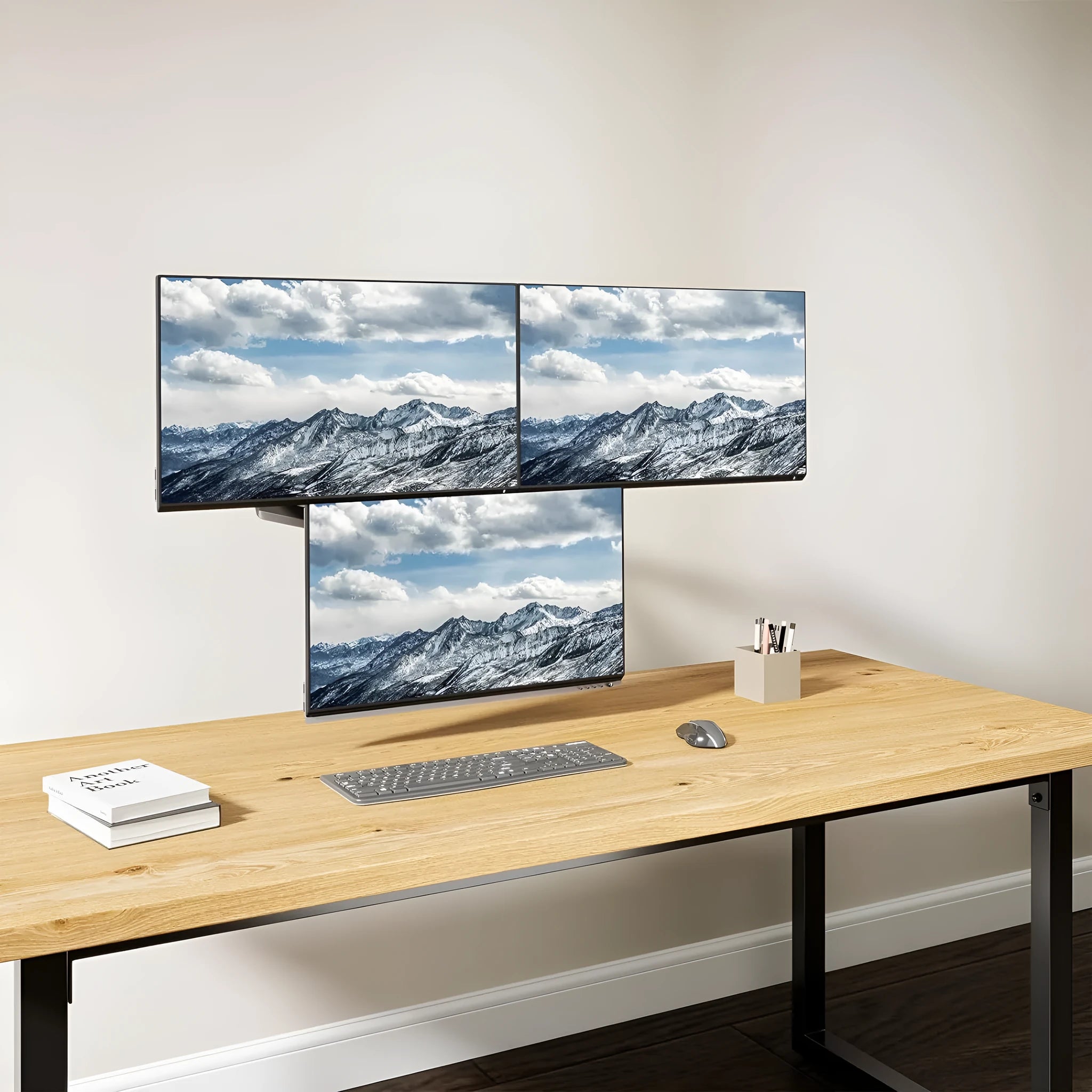 Black three-arm gas spring monitor arm for 13 to 27 inch computer screens