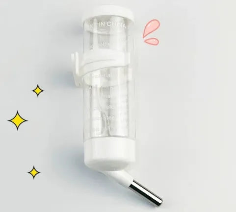 Green plastic ball kettle pet water feeder with a glass tube, showing the water filling capacity.