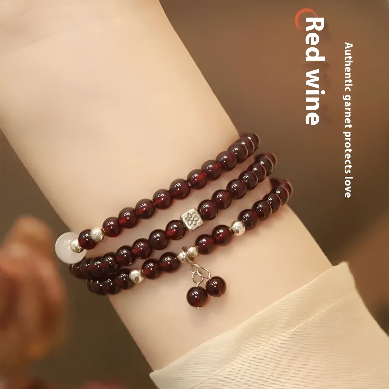 Chinese-style garnet bracelet with U-shaped design and pomegranate elements in antique style