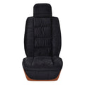 Winter car seat cushion with plush texture in various colours on a car seat