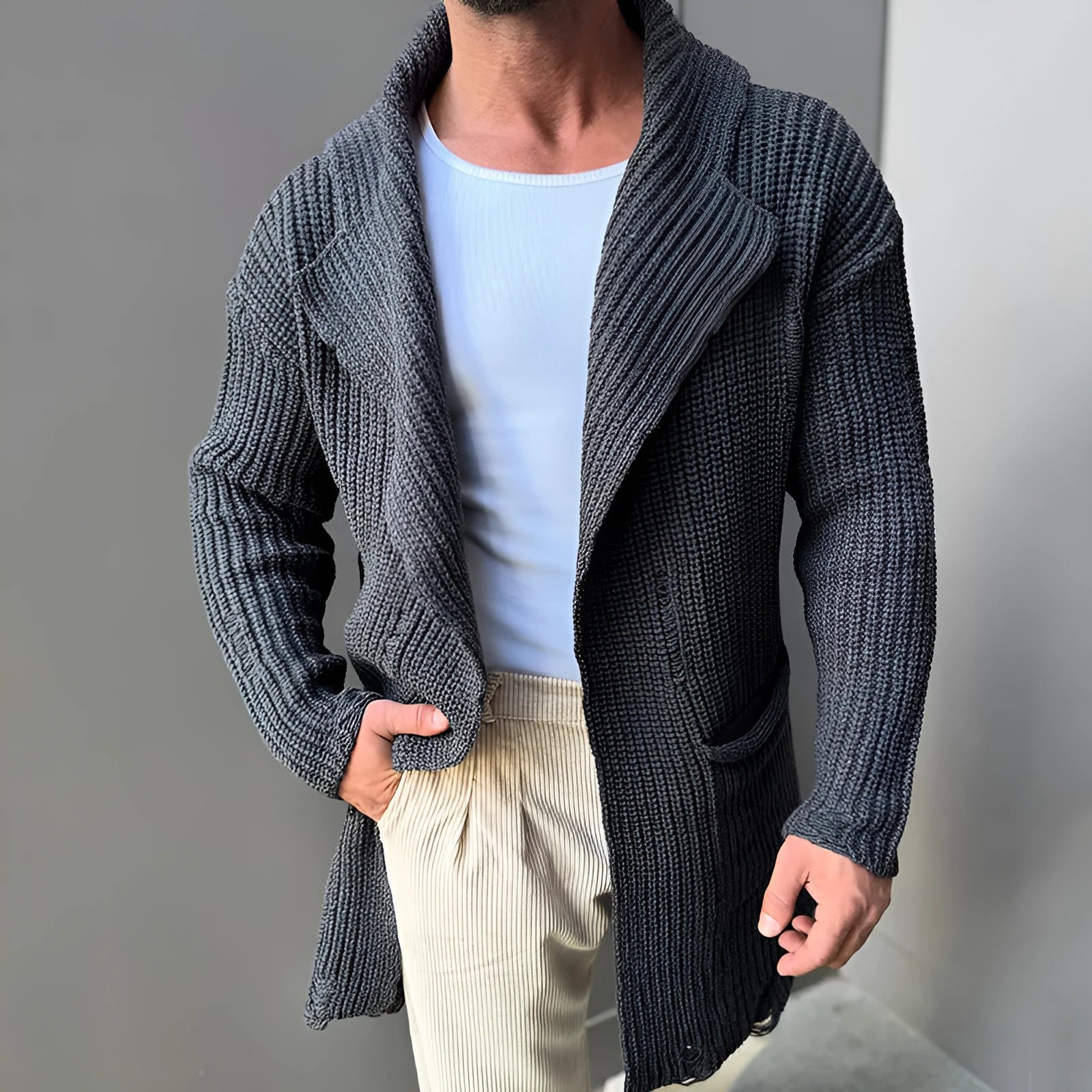 Long sleeve slim-fit mid-length knitted cardigan in army green with button front, on a model, front view