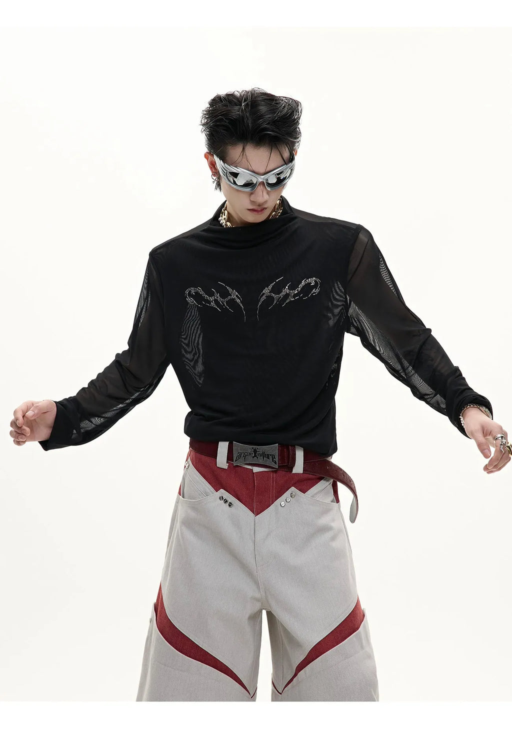 Man wearing a black slim fit long sleeve ice-feel top made from polyester and spandex blend.