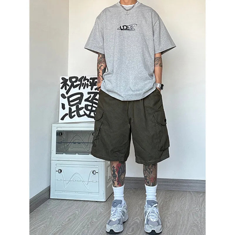 Straight-leg casual sports shorts in polyester fibre with micro-elastic properties, loose American style fit
