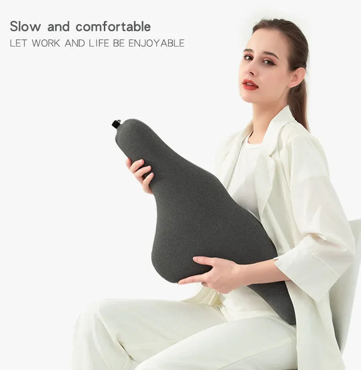 Dark gray universal car neck memory foam pillow on a car seat headrest.