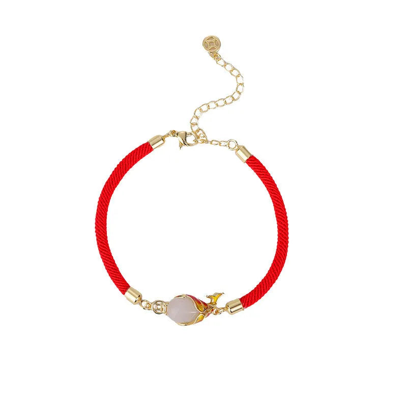 Lucky koi red copper carp literary necklace and retro bracelet on a white background.