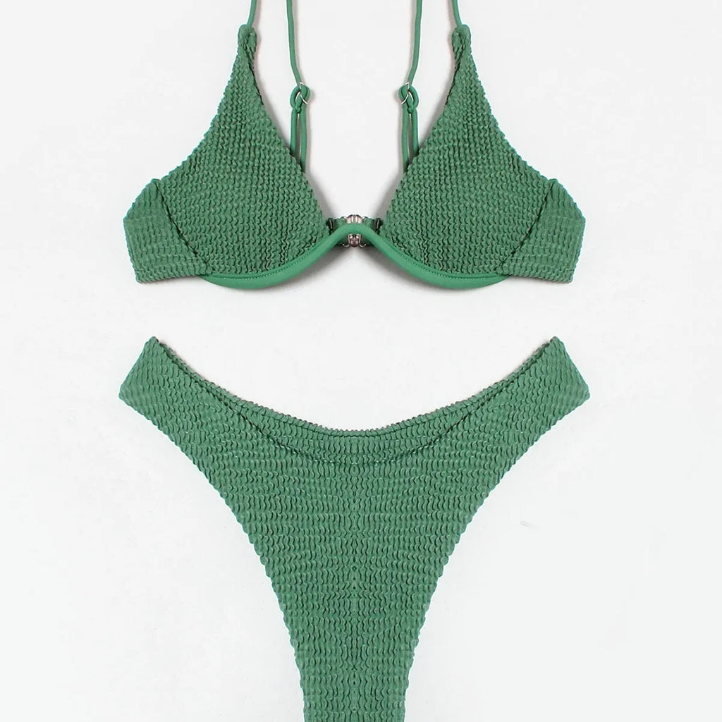 Green women's bikini swimsuit with ruffle detail and split-style briefs
