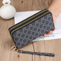 Long black PU leather wallet clutch with phone slot, card holders, and zippered coin purse