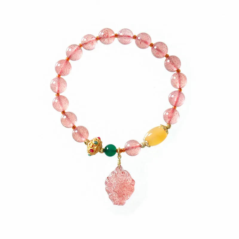Women's crystal bracelet with strawberry quartz beads and nine tail fox charm